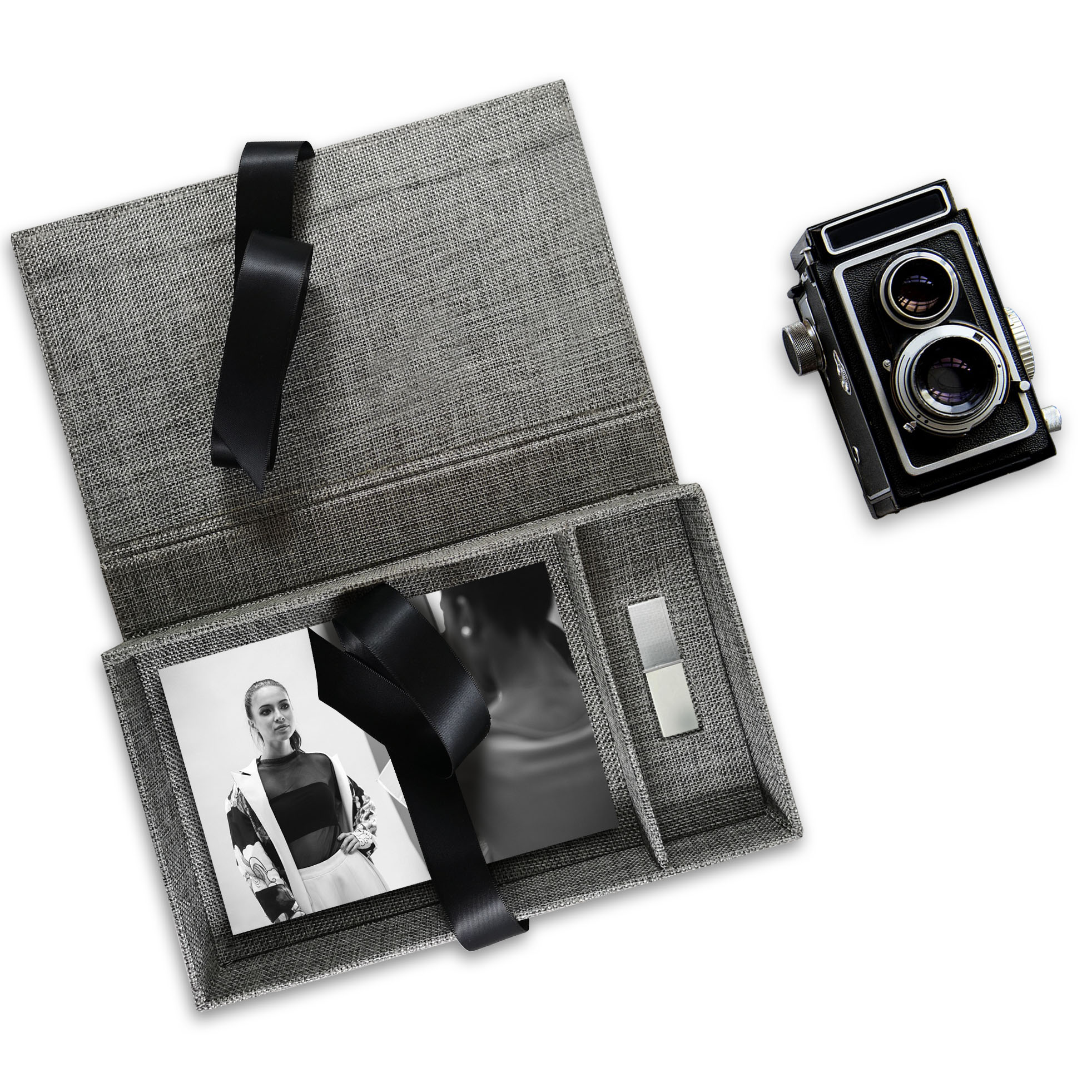 Picture shows a custom photo box in due-tone charcoal linen, recently developed for a client in Europe.