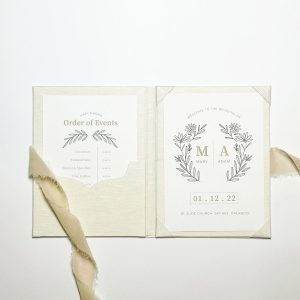 Another cream linen invitation folio with frayed edges cotton ribbon