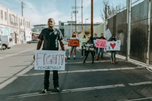 Person holding a sign during protest