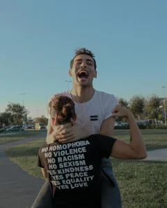 Happy couple with their custom printed T-shirts