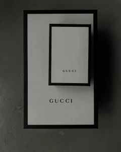 Matte black & white packaging box solution by GUCCI