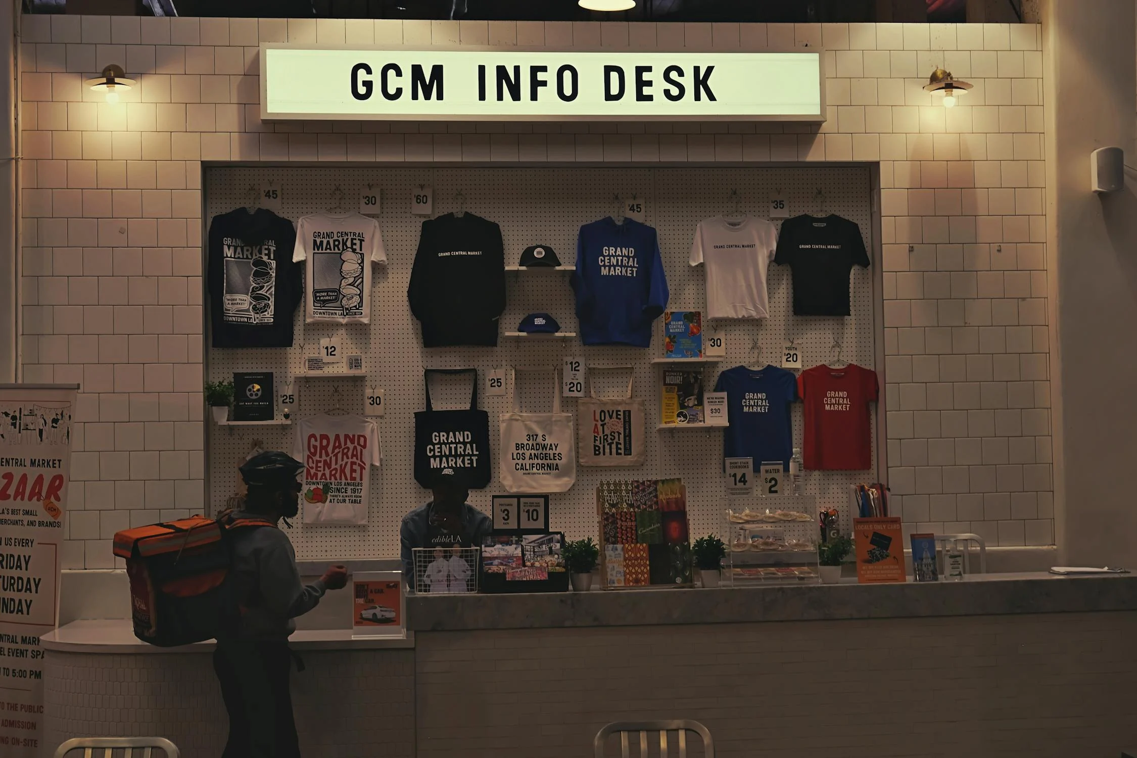Shop displays their merchandise including cotton tote bags in various sizes and colors