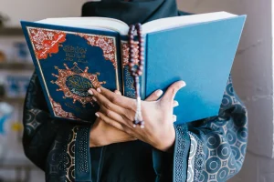 Women reading from the the Holy Quran during Eid Mubarak celebration