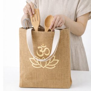Silk screen printed natural jute tote bag featuring custom logo print